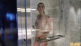 Smalltitted tranny showering while filmed